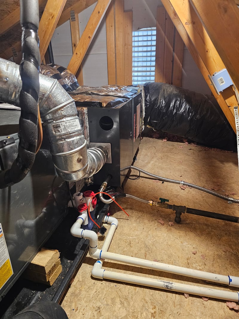 Daikin gas furnace paired with a large media-filter cabinet for whole-home air filtration.